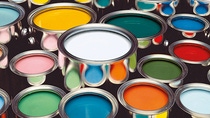 Buckets filled with colorful paint. Buckets filled with colorful paint.