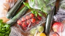 single use plastic waste issue. fruits and vegetables in plastic bags