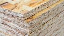 A stack of OSB sheets stacked one on another; Shutterstock ID 1233172198; Jobnummer: 022003; Projekt: BASF Website; Endkunde: BASF SE , CM/K Daniela Rechenberger; Sonstiges: BASF SE, ESI/K Matthias Baque A stack of OSB sheets stacked one on another; Shutterstock ID 1233172198; Jobnummer: 022003; Projekt: BASF Website; Endkunde: BASF SE , CM/K Daniela Rechenberger; Sonstiges: BASF SE, ESI/K Matthias Baque