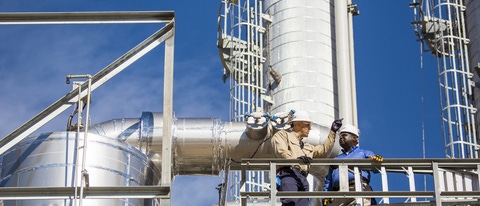 Production Manager Mark Hughes (right) and Shift Supervisor Kenny Calvaruso Jr. (left) stand at the bottom of the methylamines towers during a safety walkthrough. As the newest unit at BASF Verbund site in Geismar, Louisiana, methylamines started production in 2012. Methylamine is used in the production of agrochemicals, personal care products, detergents, pharmaceuticals, textiles, solvents and animal feed additives.