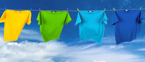 colorful shirts on washing line on green meadow; Shutterstock ID 367867325; purchase_order: 06092023; job: Präsentation etc; client: BASF SE; other: BASF SE, GBH/IM, M.Baque – E-CMI/M - F206, Annette Engeroff