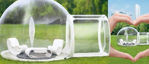 A plastic igloo on a green lawn. A plastic igloo on a green lawn.