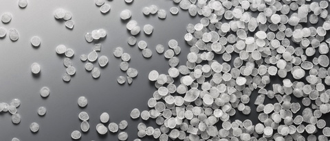 Caprolactam pallets on a grey background Caprolactam pallets on a grey background