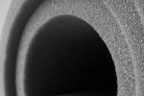 gray sponge foam roll insulated by a white background; Shutterstock ID 1476878813; Jobnummer: 022003; Projekt: BASF Website; Endkunde: BASF SE , CM/K Daniela Rechenberger; Sonstiges: BASF SE, ESI/K Matthias Baque